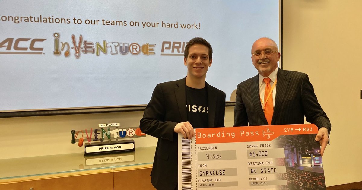 Student with a prize check