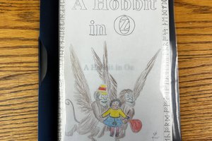 hand-written booklet with pencil drawing on cover