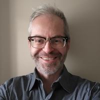 headshot of  Michael Curtis