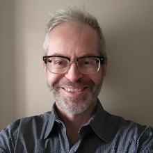 headshot of  Michael Curtis