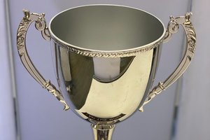 NYBPC Grand Prize trophy won by Josh Aviv ’15 G’17, with his favorite desktop sign in the LaunchPad