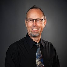 headshot of Nick Bennett