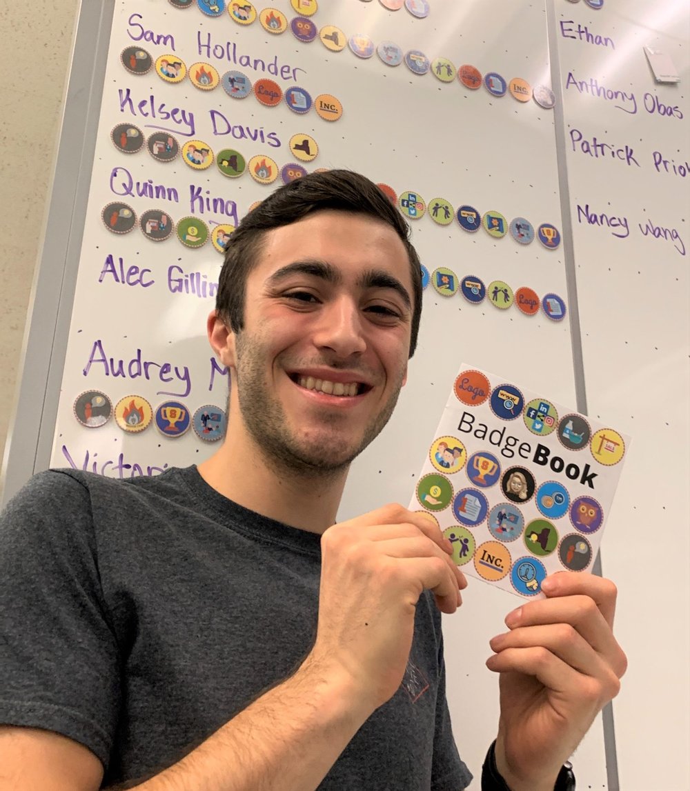man holding a booklet