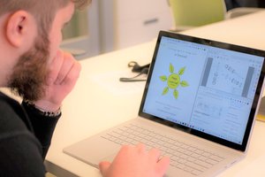 person working on laptop