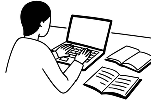 Silhouette of figure using the computer.