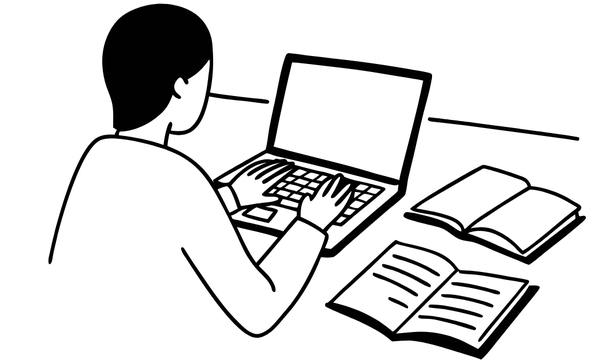 Silhouette of figure using the computer.