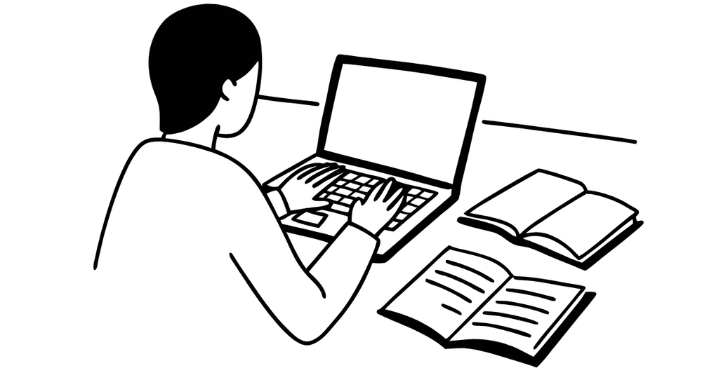 Silhouette of figure using the computer.