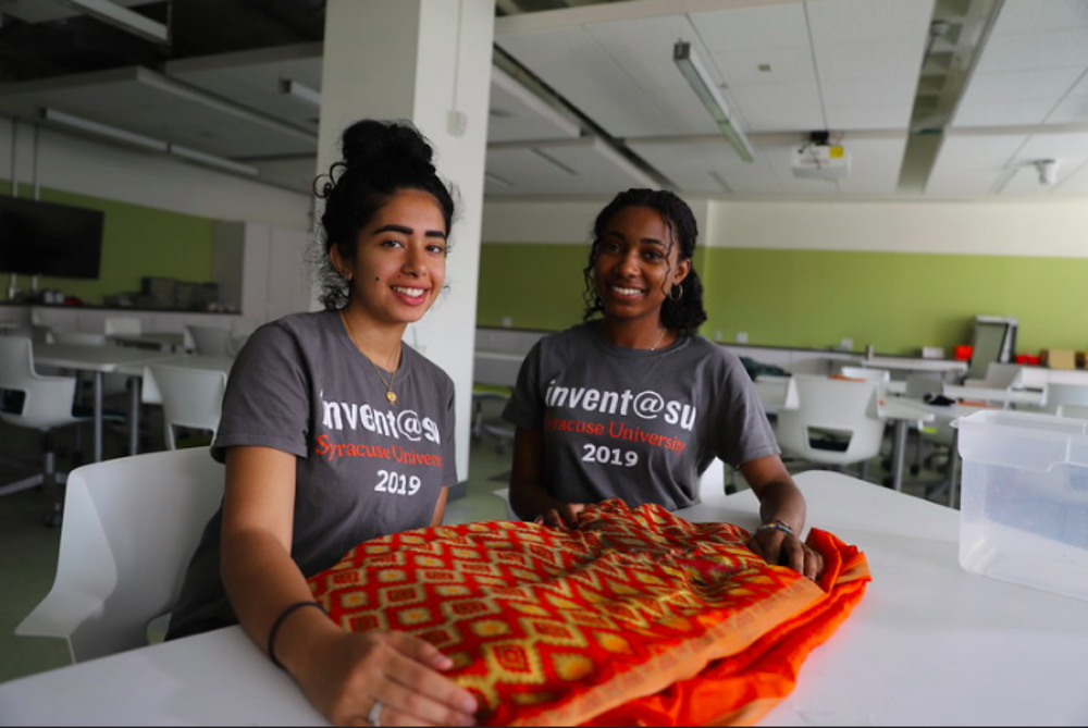 Nikita Chatterjee and Brianna Howard pose for a photo