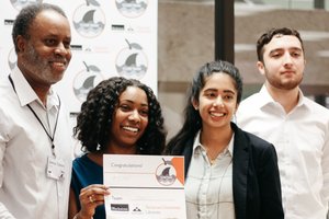 PAANI co-founders Brianna Howard and Nikita Chatterjee, with team member Jacob Sardino, with ‘Cuse Tank judge and SU parent James H. Bason, President & CEO, TruFund Financial Services, Inc. (left)