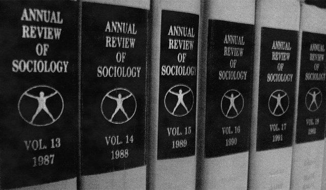 Black and white row of books titled "Annual Review of Sociology" volumes 13 through 18 dated 1987 through 1992