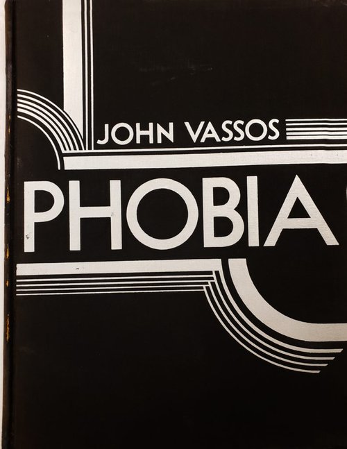 Black and white text with art deco designs stating John Vassos Phobia.