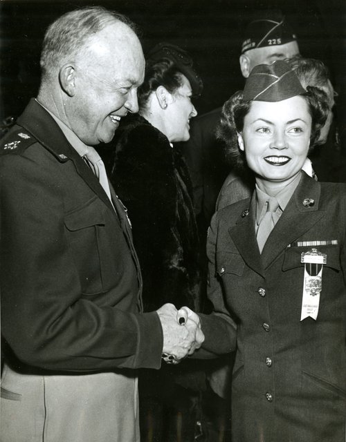 Photograph of Margaret Hastings and Dwight Eisenhower after her return from New Guinea, November 1945. Photograph by ACME. Margaret Hastings Collection.