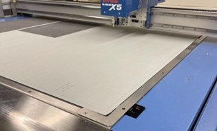 close up of box cutter machine