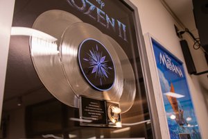 Platinum records and award from the Disney movie Frozen II and Moana, donated by Tom MacDougall ’92