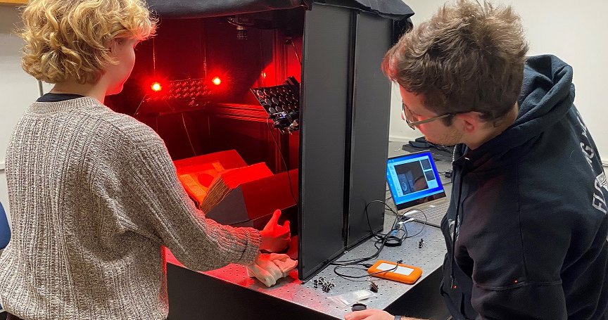 students using multispectral imaging technology to review medieval manuscripts at Rochester Institute of Technology