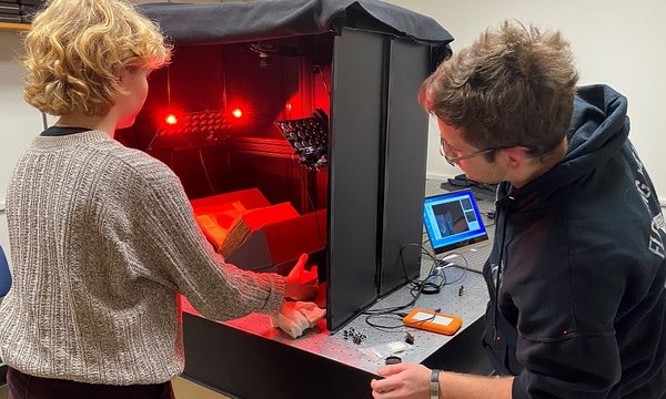 students using multispectral imaging technology to review medieval manuscripts at Rochester Institute of Technology