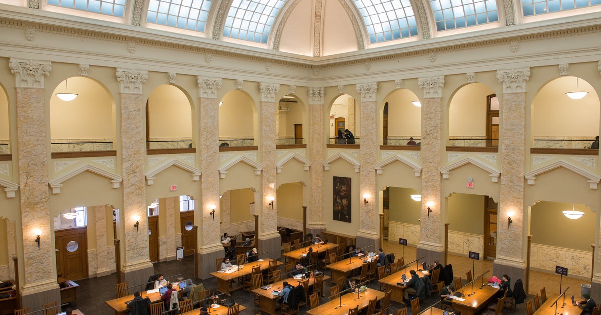 Carnegie Library reading room with large wooden tables