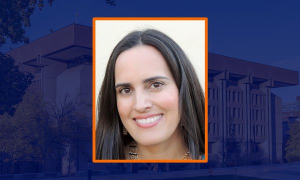 headshot of woman with blue sepia of Bird Library in background