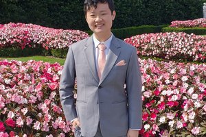 Richard Jiang poses for a photo