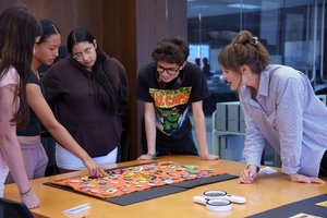 Students respond to an assortment of political buttons during a session at SCRC.