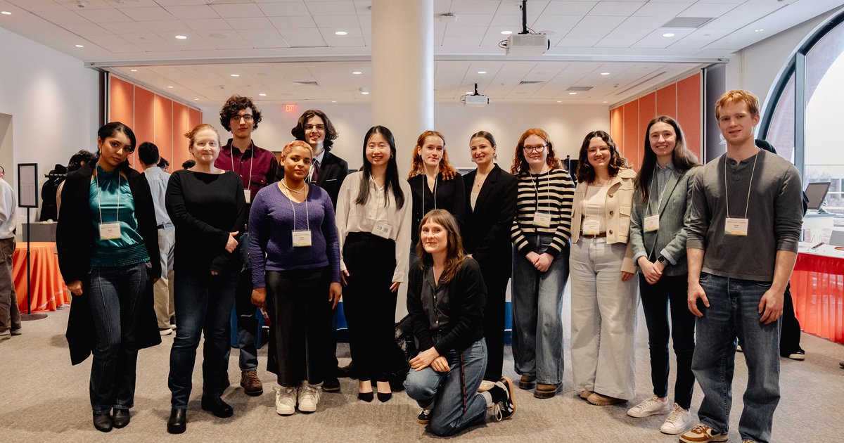 group of people posing for picture