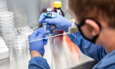 close up of someone working in a campus faculty lab