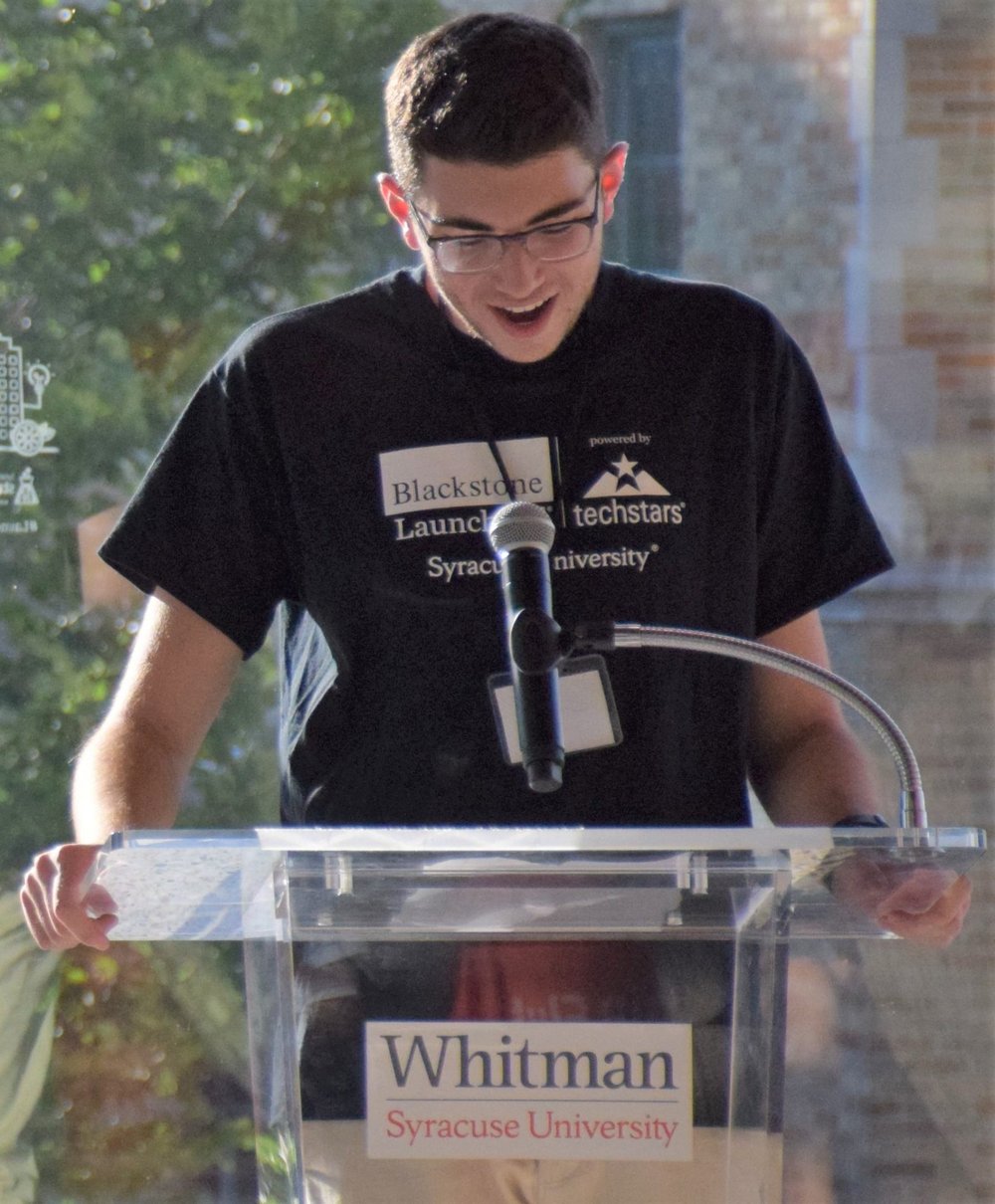 student at a podium