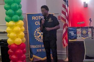 person standing in front of room presenting