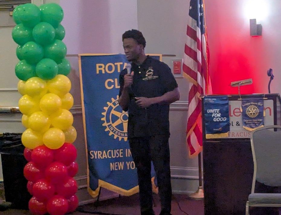 person standing in front of room presenting