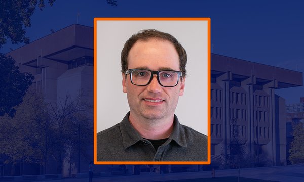 headshot in square with sepia background of Bird Library