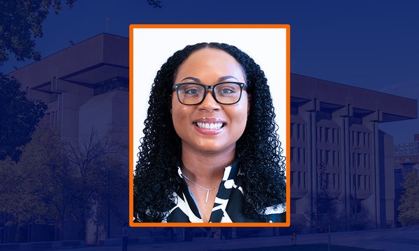 headshot seyvion scott inside box with blue background