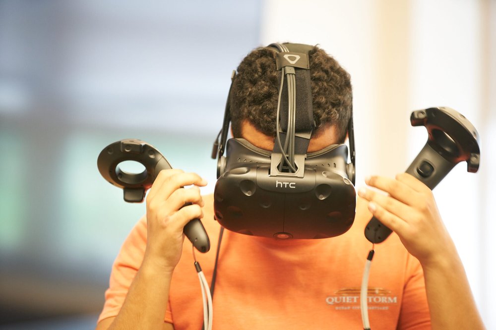 a man put on a VR headset