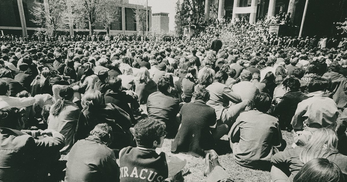 Black and white image of Photograph of students and campus community members gathered in front of Hendricks Chapel for the May 4 rally, 1970
