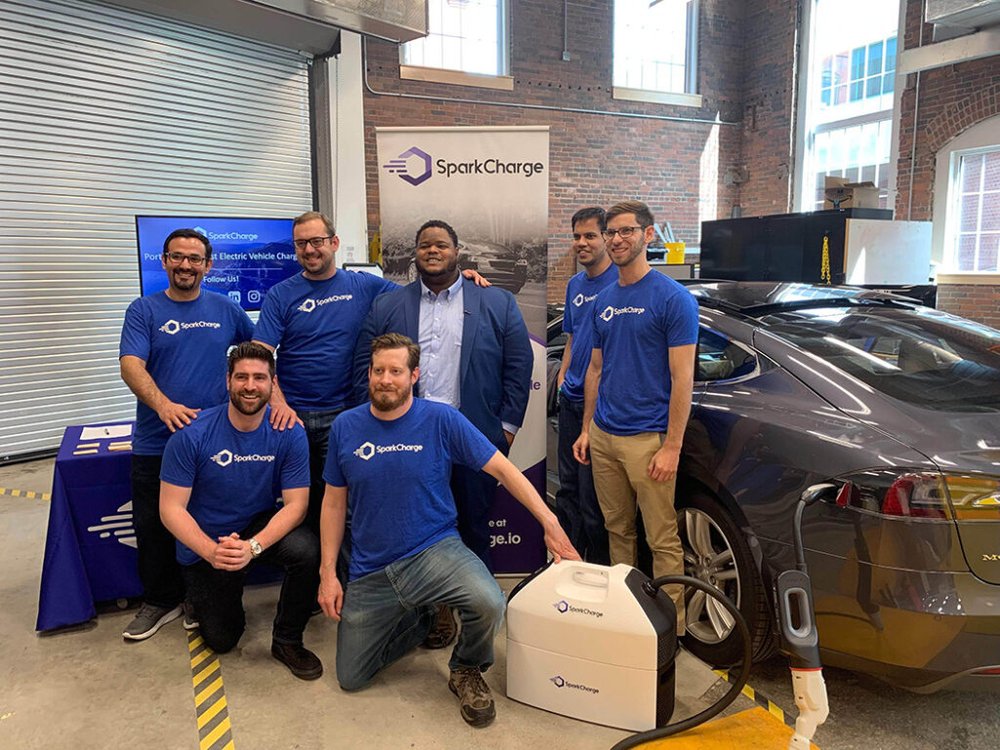 SparkCharge team pose for a group photo
