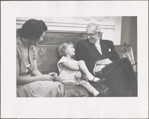 Spock talking with a patient at the health center. Benjamin Spock and Mary Morgan Papers.