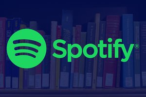 Green Spotify logo and wordmark over blue overlaid background of a book shelf