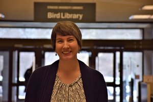 Stephanie McReynolds smiling for a photo in Bird Library