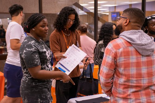 Summer Start students talking to campus representative