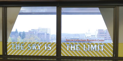 “Survival Kit- Provisions for your Research Journey” Sky is The Limit banner in the Plastics Pioneers Reading Room.