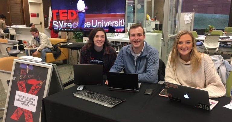 students at TEDx table