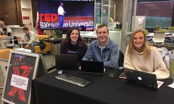 students at TEDx table