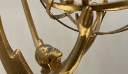 emmy's and description on display in case