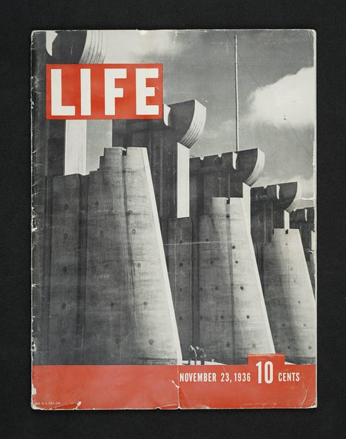 The first issue of Life Magazine dated November 23, 1936, featuring Margaret Bourke White’s photograph of the Fort Peck Dam’s spillway. Rare books.