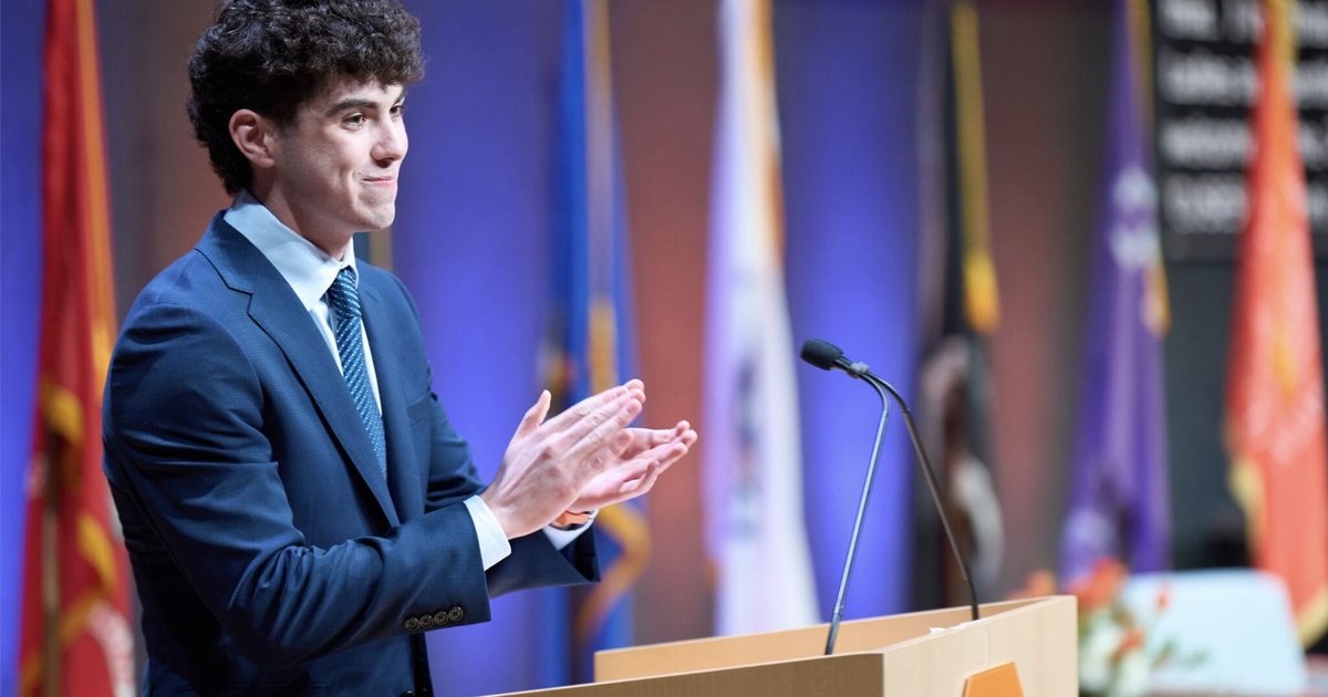person speaking at podium