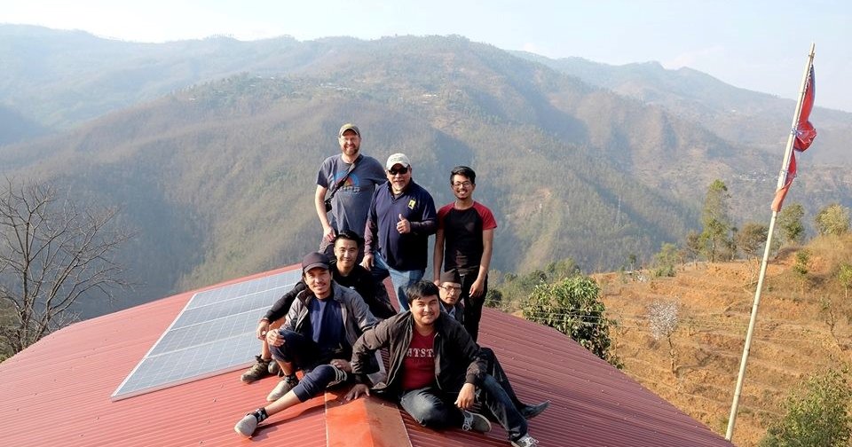 people sitting on the roof