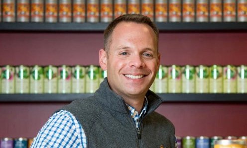 Todd Rubin smiles for a photo