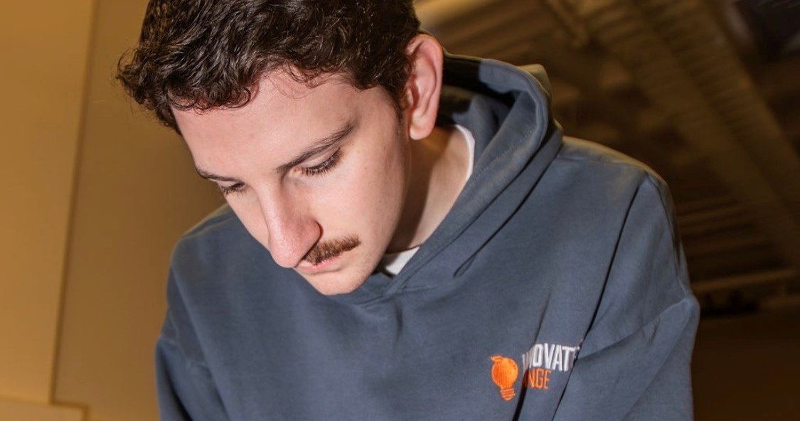 young man working on product