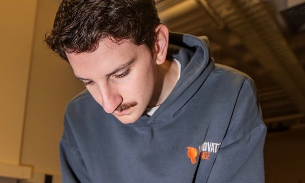 young man working on product