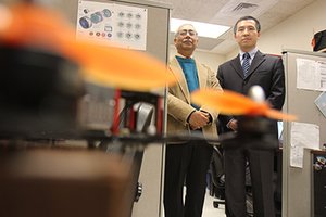 A project being developed by College of Engineering & Computer Science Professor Utpal Roy, left, and Ph.D. student Yunpeng Li is one of six finalists in the Genius NY 2018 Competition. The competition will be held April 9 in Syracuse.