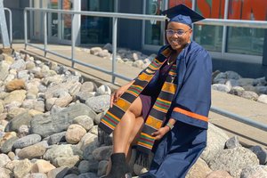 Woman in graduation regalia